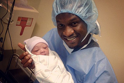 Paul and son - paul-okoye